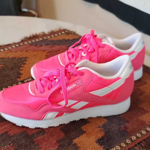 pink and red reeboks